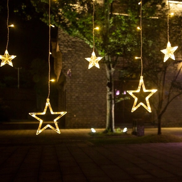 Instalatie de Craciun, Zola®, perdea curgatoare cu franjuri inegale si stelute, 138 leduri, lumina calda, impermeabilitate IP44, lungime totala 550 cm, 230V