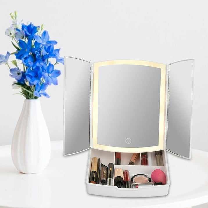 Oglinda cosmetica pliabila, Zola, lumini LED, marire 5x, compartiment de organizare, 3 moduri de iluminare, comutator tactil, functionare 4 baterii/alimetare cablu USB inclus, dimensiune pliata 24.5 x 20 cm, dechisa 39 x 34 cm, alba