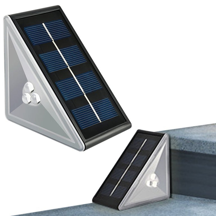 Set 2 lampi solare LED, UBX, pentru scara cu senzor de crepuscul, IP67, 0.3 W, 8x8x5.5 cm, neagra