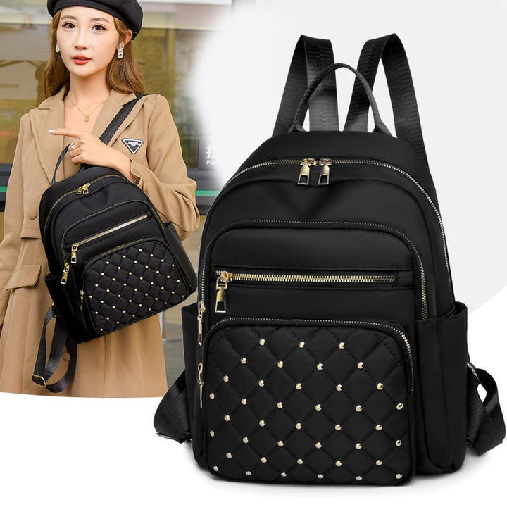 Rucsac dama, Zola®, bretele reglabile, 3 compartimente, model romburi cu detalii aurii, negru, 32x27x12 cm