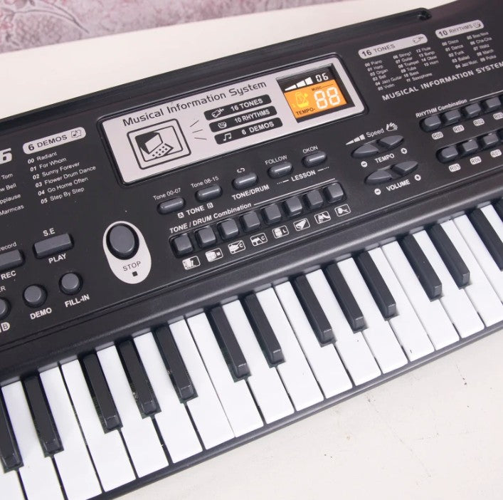 Orga electronica, Zola®, cu microfon, inregistare melodii, 61 clape, multiple tonuri si ritmuri, 54 x 17 cm