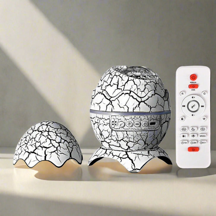Proiector de stele in forma de ou dinozaur, Zola, bluetooth, 4 moduri de iluminare, 19 sunete de relaxare, 10W, telecomana, alb