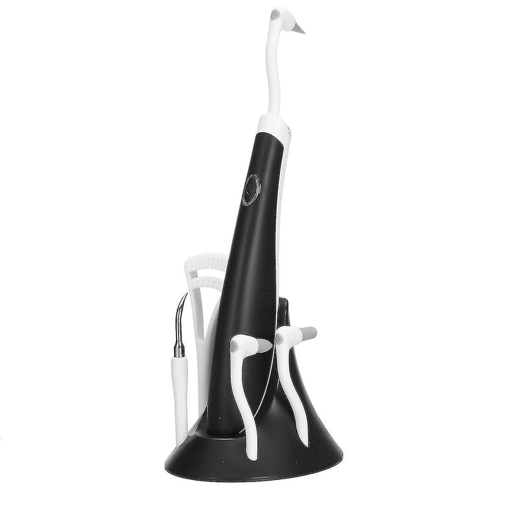 Dispozitiv electric de indepartarea tartrului dentar, UBX, multifunctional, cu 5 capete diferite, negru/alb, vibratii pana la 15000 rpm