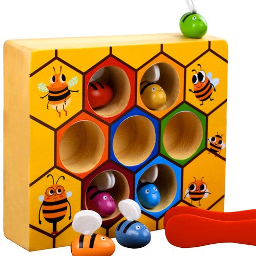 Joc educativ din lemn, pentru copii, Zola®, model fagure, cu 7 albine colorate si penseta din plastic rosie, 20x14.7x4.5 cm
