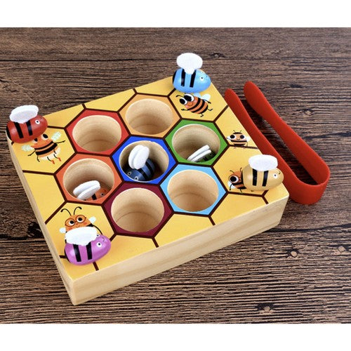 Joc educativ din lemn, pentru copii, Zola®, model fagure, cu 7 albine colorate si penseta din plastic rosie, 20x14.7x4.5 cm