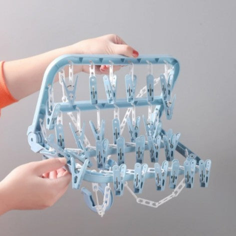 Uscator pentru lenjerie si sosete, Zola®, cu 32 clesti, plastic, 32.5x32.5 cm, albastru