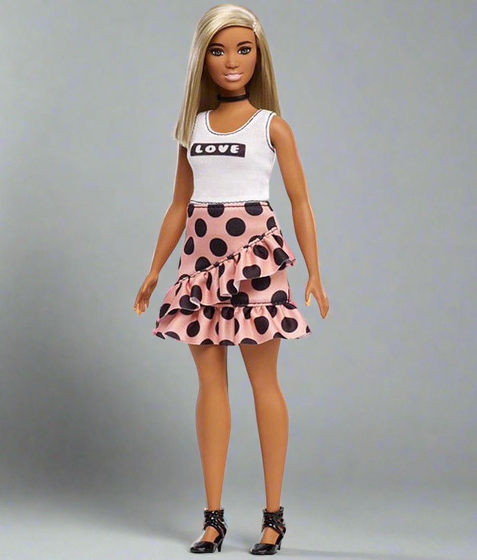 Papusa Barbie Fashionistas ,cu fusta bej si buline negre